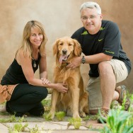 Portrait of a Golden Retriever and his owners